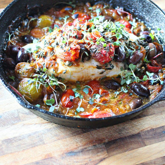 Baked Halibut with White Wine, Capers, Kalamata Olives, Tomatoes & Microgreens