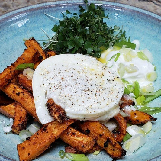 Seasoned Sweet Potato Fries with Poached Egg, Greek Yogurt, Green Onions & Kale Microgreens