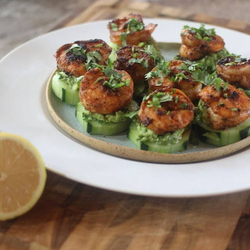 Blackened Shrimp Cucumber Bites with Guac & Garlic Greens