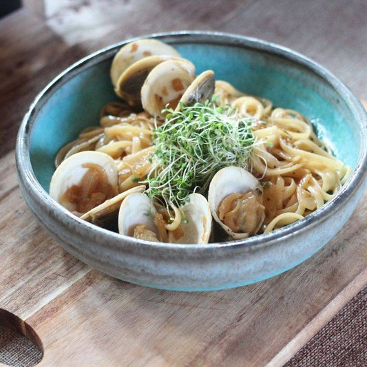 Clams in Buttered White Wine, Thyme & Caramelized Onion Linguine Pasta with Peppery Arugula Microgreens